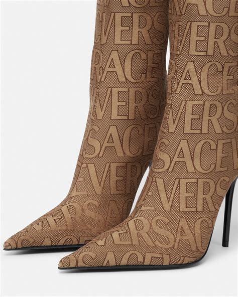 versace thigh high denim boots|Versace knee high boots.